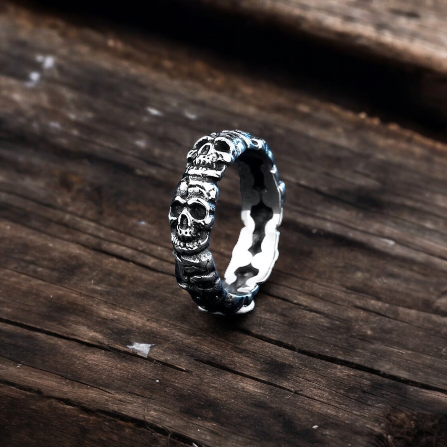 SURROUNDED STAINLESS STEEL SKULL RING